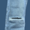 Non strech Raw wash straight fit light blue jean. Left side knee raffu